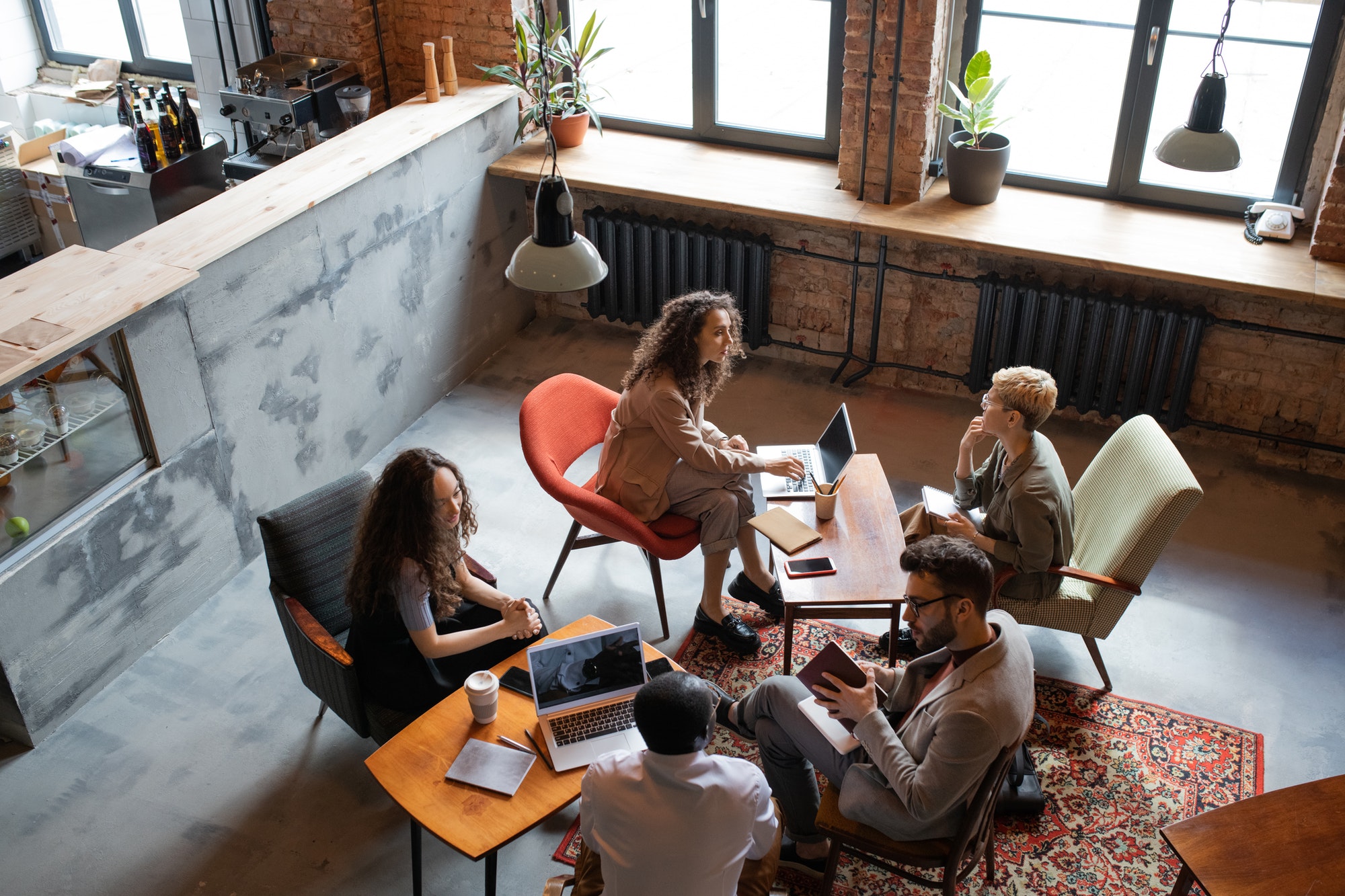 group-of-intercultural-co-workers-discussing-working-points